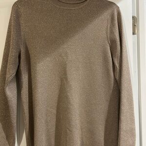 Women’s metallic gold turtle neck sweater
